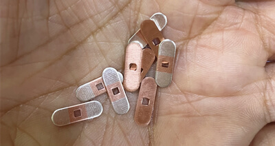 Forsendelse til stemplinger lavet af sølvindlægsstrimmel